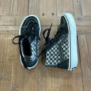 Vans hi top black checkerboard sneakers